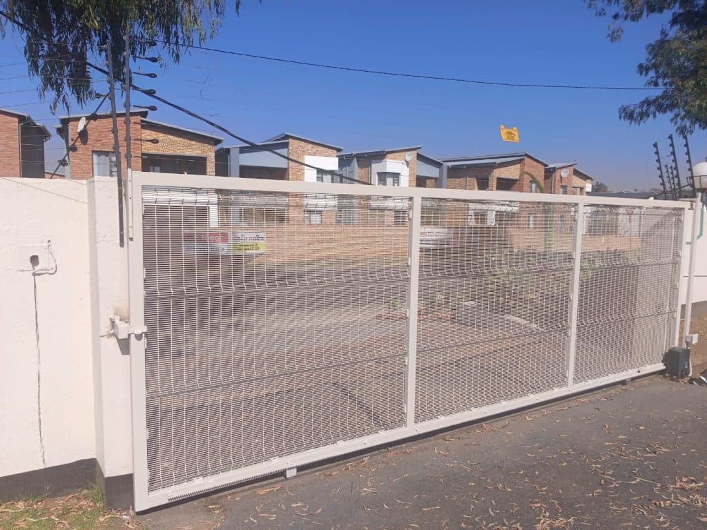 Clearview-style mesh security gate at a residential complex